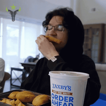 A person eating Zaxby's