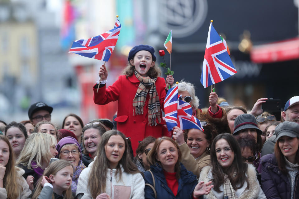 Local Galwegians await the arrival of the Duke and Duchess of Cambridge for a visit to a traditional Irish pub in Galway city centre during the third day of their visit to the Republic of Ireland.