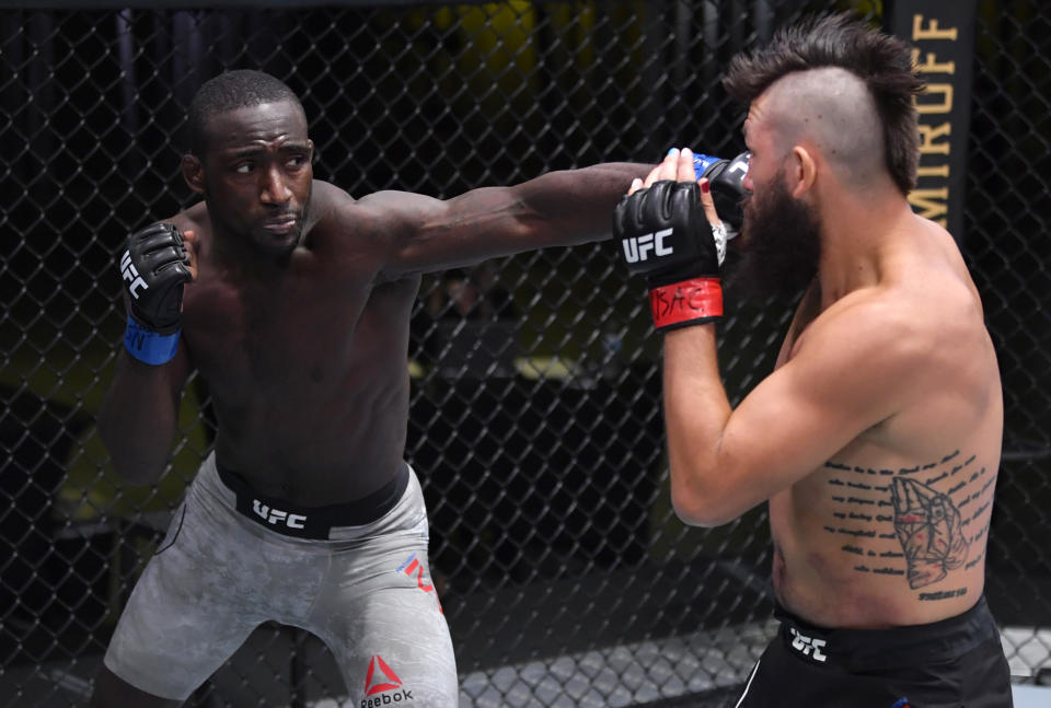 LAS VEGAS, NEVADA – SEPTEMBER 12: (L-R) Anthony Ivy punches Bryan Barberena in a welterweight fight during the UFC Fight Night event at UFC APEX on September 12, 2020 in Las Vegas, Nevada. (Photo by Jeff Bottari/Zuffa LLC)