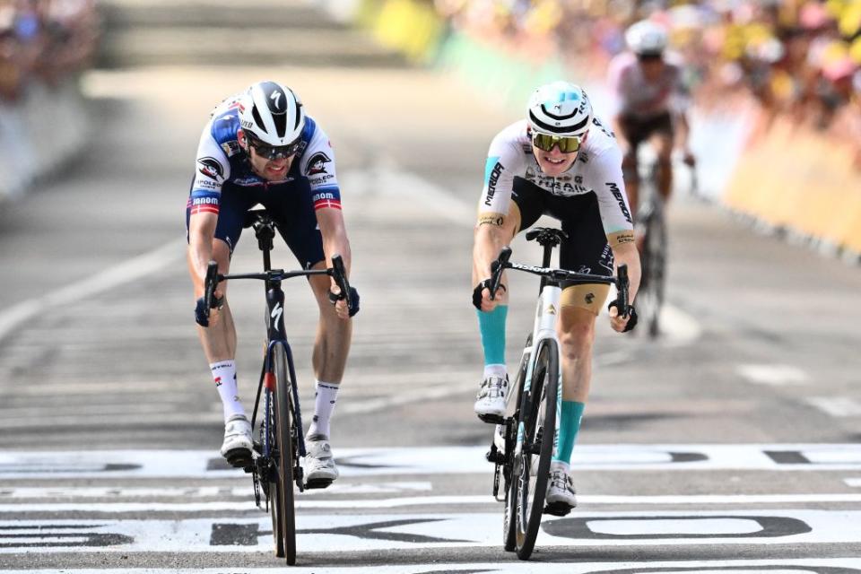 TOPSHOT  Bahrain  Victorious Slovenian rider Matej Mohoric R sprints to the finish line with Soudal QuickSteps Danish rider Kasper Asgreen L to win the 19th stage of the 110th edition of the Tour de France cycling race 173 km between MoiransenMontagne and Poligny in the Jura department of centraleastern France on July 21 2023 Photo by Marco BERTORELLO  AFP Photo by MARCO BERTORELLOAFP via Getty Images