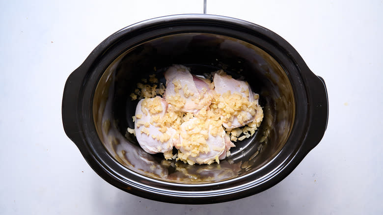 onion and chicken in slow cooker