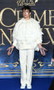 <p>Ezra Miller demonstrated his red carpet know-how in a white feathered cape and tailored trousers by Givenchy for a red carpet photocall. Silver hairtips and writing on his hands finished the unusual ensemble. <em>[Photo: Getty]</em> </p>