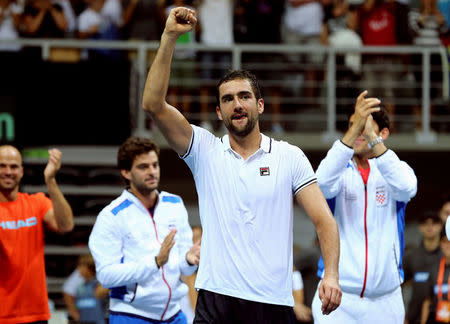 Tennis - Croatia v France - Davis Cup World Group Semi Final - Kresimir Cosic Hall, Zadar, Croatia - 18/9/16 Croatia's Marin Cilic reacts after winning his men's singles match against France's Richard Gasquet. REUTERS/Antonio Bronic