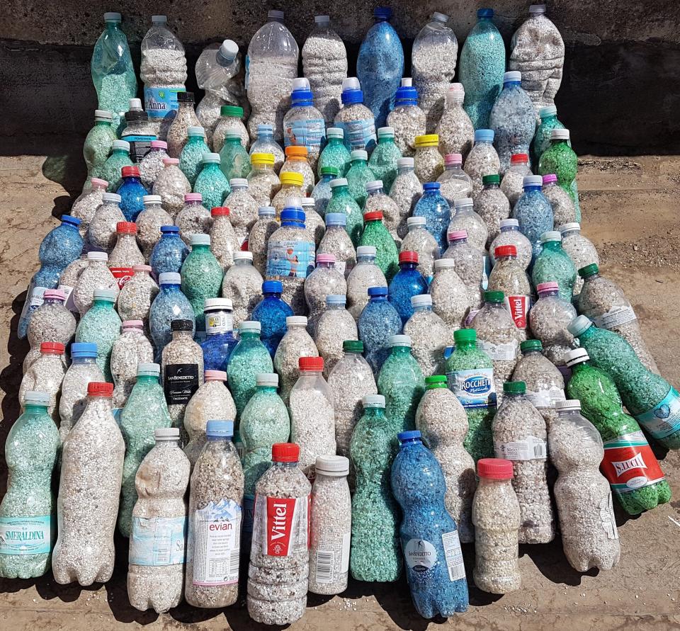 The bottles of 90kg of stolen sand from Sardinia seized by Italian authorities.