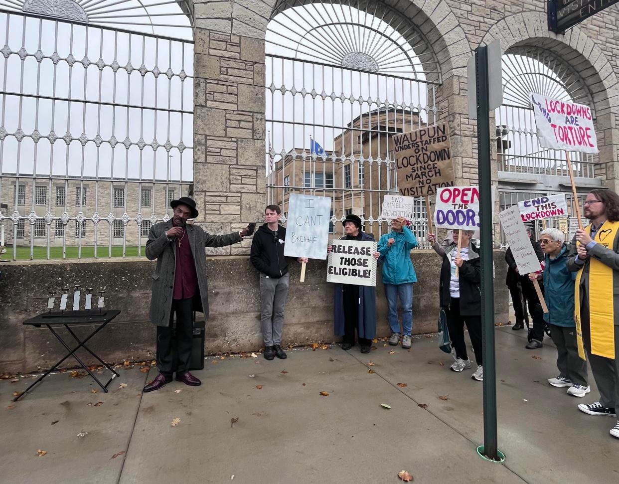 James Morgan of MOSES, speaks outside of Waupun Correctional Institution on Wednesday during a protest against conditions at the facility. Waupun has been locked down since March.