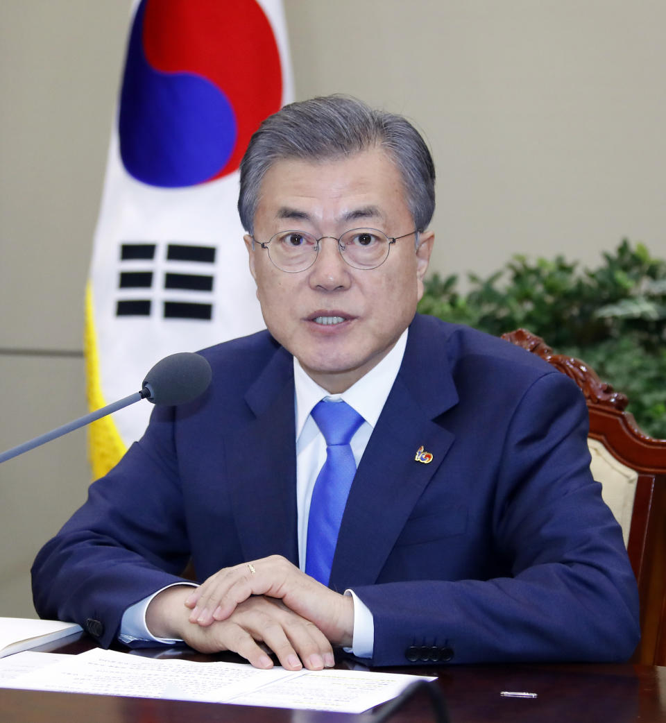 South Korean President Moon Jae-in presides over a meeting of the National Security Council at the presidential Blue House in Seoul, South Korea, Monday, March 4, 2019. Moon said Seoul will actively try to get the nuclear negotiations between Washington and Pyongyang quickly back on track. (Bae Jae-man/Yonhap via AP)