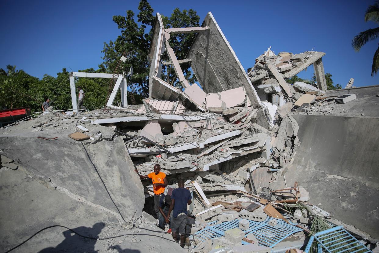 The residence of the Catholic bishop lays in ruins after an earthquake in Les Cayes, Haiti, Saturday, Aug. 14, 2021. A 7.2 magnitude earthquake struck Haiti on Saturday, with the epicenter about 125 kilometers (78 miles) west of the capital of Port-au-Prince, the U.S. Geological Survey said.