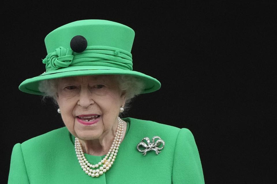 FILE - Queen Elizabeth II stands on the balcony during the Platinum Jubilee Pageant at the Buckingham Palace in London, Sunday, June 5, 2022, on the last of four days of celebrations to mark the Platinum Jubilee. Buckingham Palace says Queen Elizabeth II is under medical supervision as doctors are 
