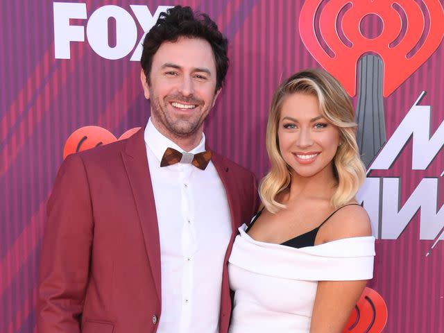 <p>Jon Kopaloff/FilmMagic</p> Beau Clark and Stassi Schroeder arrive at the 2019 iHeartRadio Music Awards