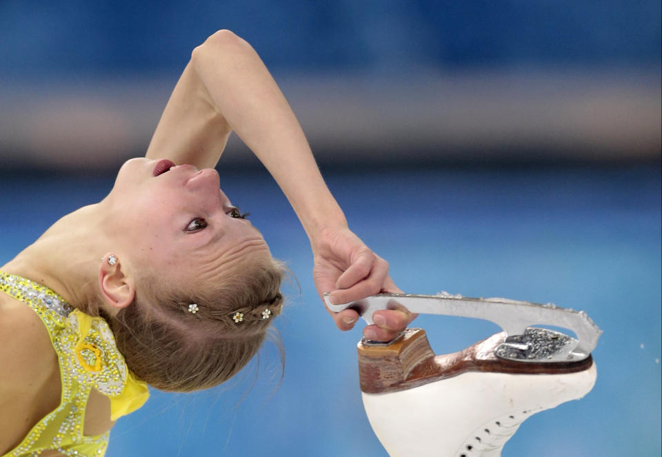 Polina Edmunds of the United States competes in the women's short program figure skating competition at the Iceberg Skating Palace during the 2014 Winter Olympics, Wednesday, Feb. 19, 2014, in Sochi, Russia.