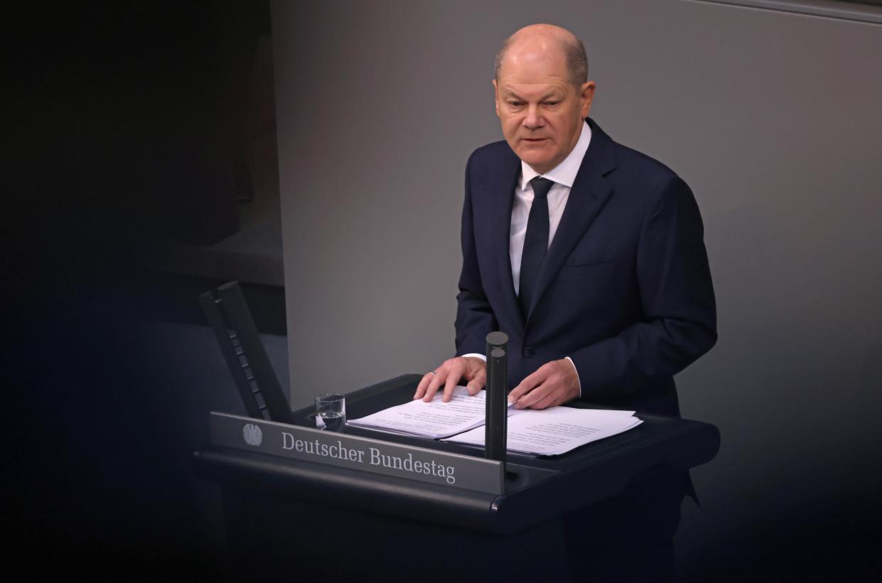German Chancellor Olaf Scholz speaks in the Bundestag one year on since his 