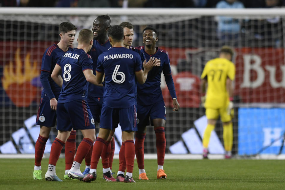 Chicago Fire forward Kei Kamara (23) celebrates with teammates after scoring during the first half of an MLS soccer game against Minnesota United Saturday, April 8, 2023 in Chicago. Chicago won 2-1. (AP Photo/Paul Beaty)