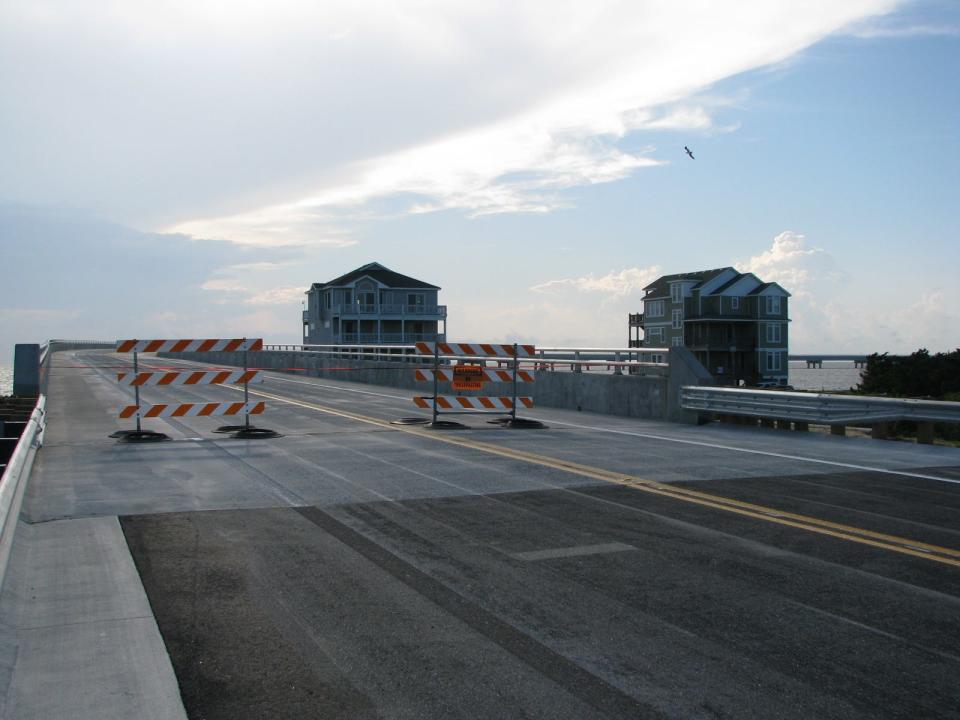 A picture of the N.C. 12 jug-handle bridge leaving Rodanthe and swinging out over Pamlico Sound taken just days before it opened.