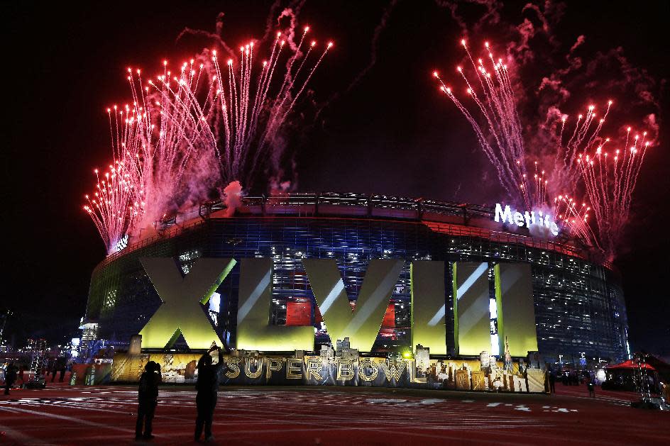 Fireworks burst over MetLife Stadium before the NFL Super Bowl XLVIII football game between the Seattle Seahawks and the Denver Broncos, Sunday, Feb. 2, 2014, in East Rutherford, N.J. (AP Photo/Seth Wenig)