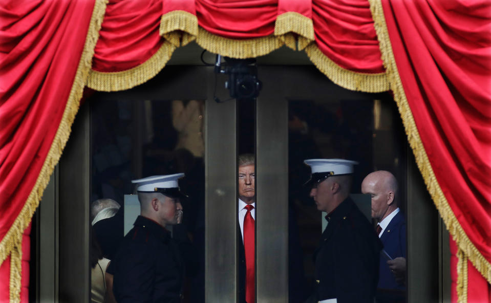 <p>JAN. 20, 2017 – President-elect Donald Trump waits to step out onto the portico for his Presidential Inauguration at the U.S. Capitol in Washington. (Photo: Patrick Semansky/AP) </p>