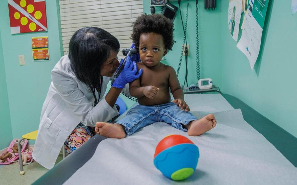 Dr. Tina Carroll-Scott checks on patient Dillon Burkhalter, 21 m.o. during a visit to her office at the South Miami Children’s Clinic, on Wednesday, October 04, 2023.