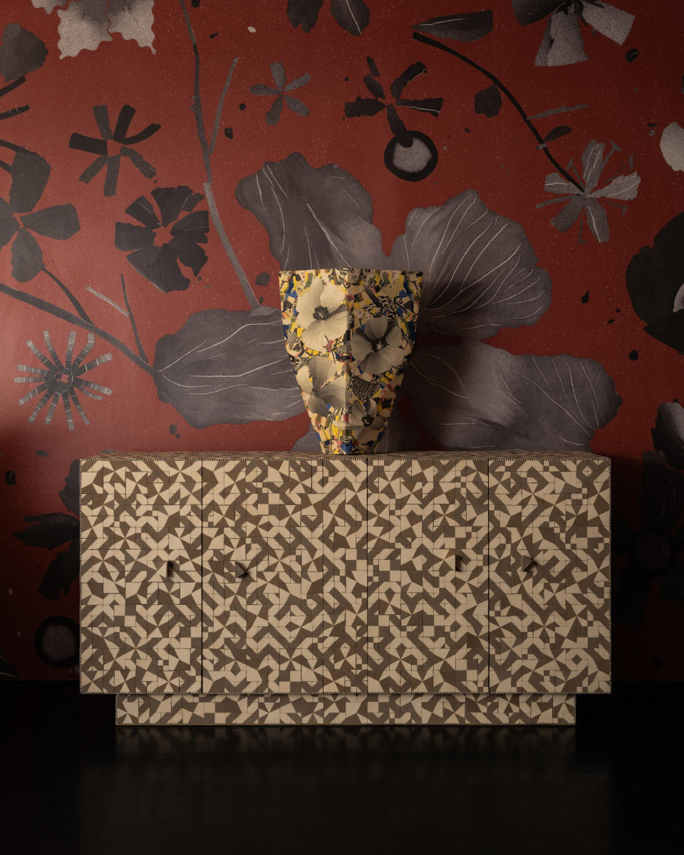 A Cody Hoyt vessel in front of Calico Wallpaper’s collaboration, Botanica, shown here in inlaid, photographed at design studio The Future Perfect.