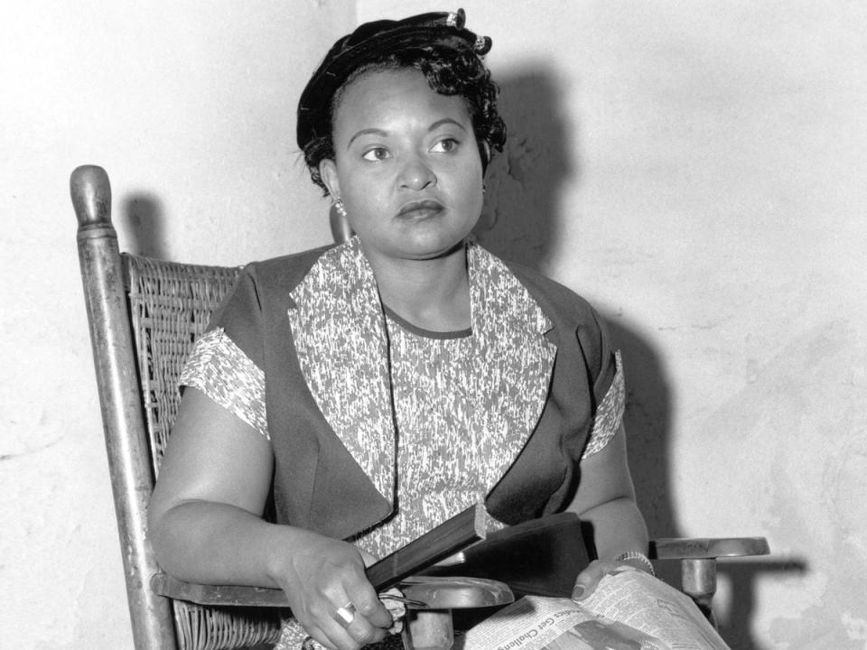 American civil rights activist Mamie Till (1921-2003), the mother of Emmett Till, sitting with a copy of the Clarion-Ledger newspaper on her lap, in Sumner, Mississippi, 22nd September 1955. (Bettmann Archive/Getty)