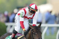 Jose Ortiz atop Early Voting, reacts after winning the 147th running of the Preakness Stakes horse race at Pimlico Race Course, Saturday, May 21, 2022, in Baltimore. (AP Photo/Nick Wass)