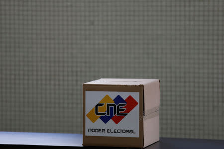 A voting box is seen at an empty polling station during the municipal legislators election in Caracas, Venezuela December 9, 2018. REUTERS/Marco Bello