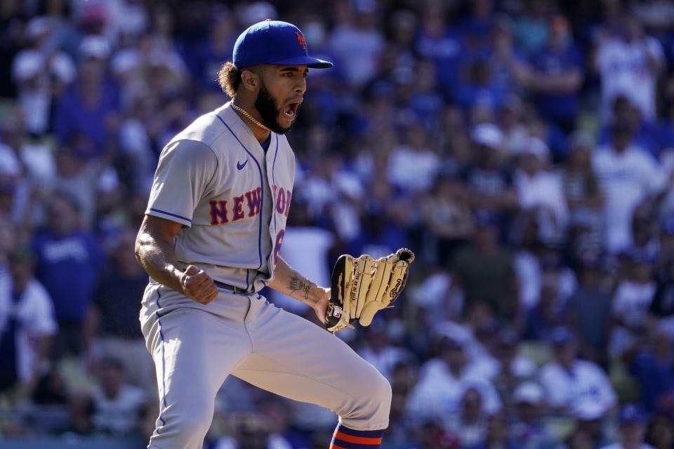 New York Mets relief pitcher Adonis Medina celebrates after striking out Los Angeles Dodgers' Will Smith to end the game in the 10th inning of a baseball game Sunday, June 5, 2022, in Los Angeles. The Mets won 5-4. (AP Photo/Mark J. Terrill)