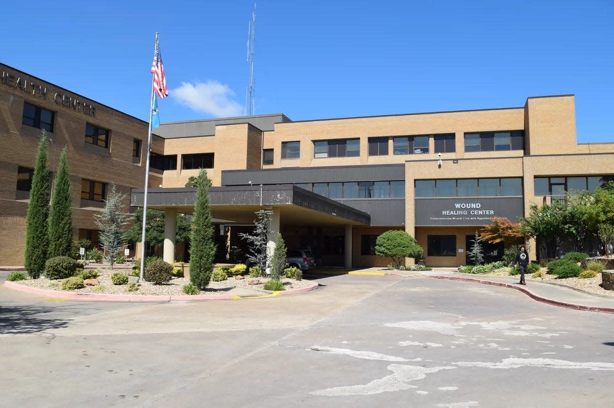 In McAlester, Oklahoma, lawsuits brought by McAlester Regional Health Center have provided business for some, such as the Adjustment Bureau, a local collection agency run out of a squat concrete building down the street from the courthouse.