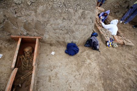 Archaeologists work at the Viminacium site, around 100km east from Belgrade, Serbia August 8, 2016. Picture taken August 8, 2016. REUTERS/Djordje Kojadinovic