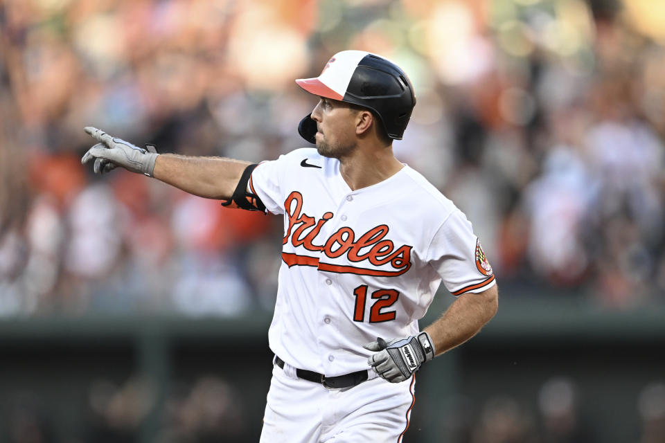 Baltimore Orioles' Adam Frazier celebrates after hitting a three-run home run against the New York Yankees in the first inning of a baseball game Sunday, July 30, 2023, in Baltimore. (AP Photo/Gail Burton)