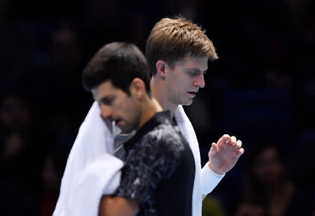 Tennis - ATP Finals - The O2, London, Britain - November 17, 2018 Serbia's Novak Djokovic and South Africa's Kevin Anderson during their semi final match Action Images via Reuters/Tony O'Brien