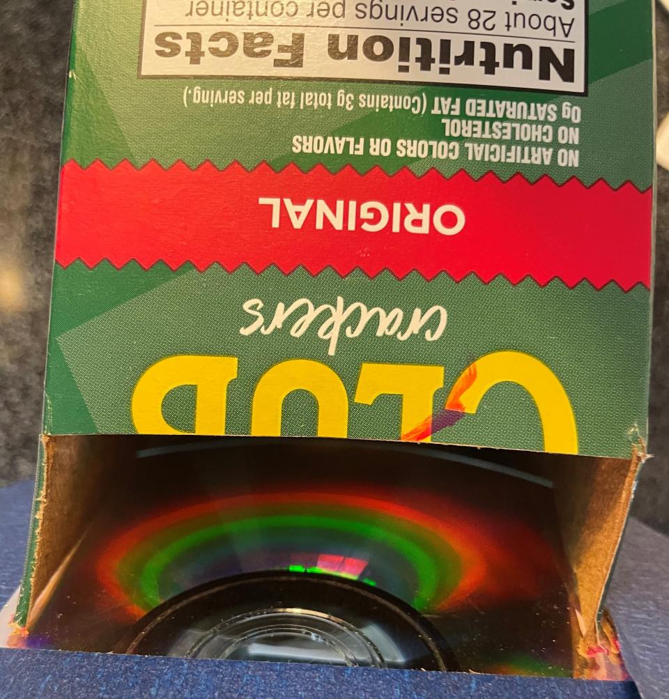 A cracker box and CD combine to produce a spectrometer and the color spectrum, during a STEM project last week at Utica Middle School.