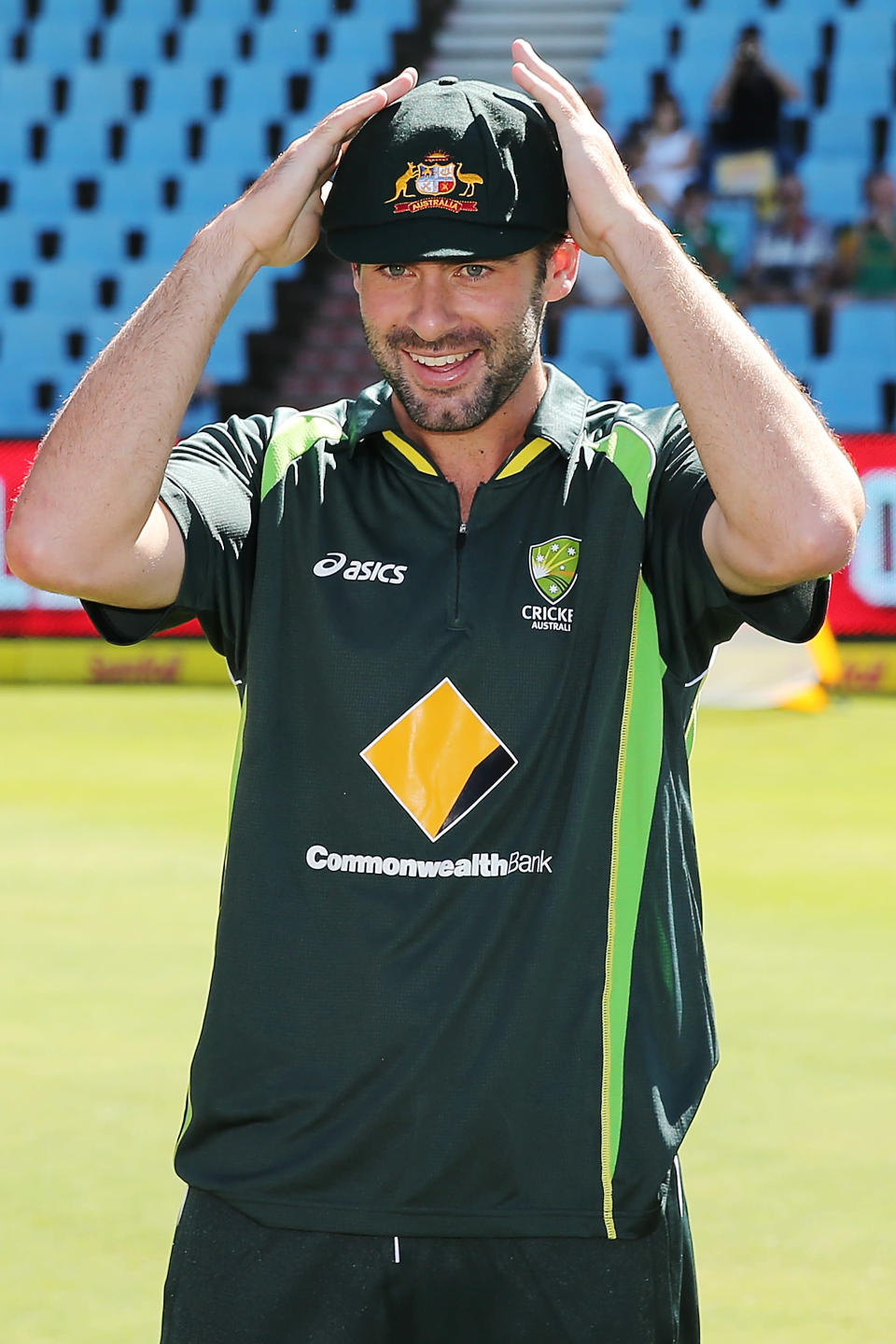 Alex Doolan of Australia is congratulated by teammates after receiving his cap before day one of the First Test match between South Africa and Australia on February 12, 2014 in Centurion, South Africa. (Photo by Morne de Klerk/Getty Images)