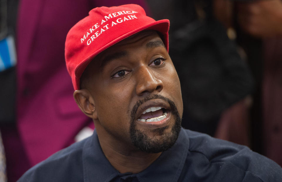 Rapper Kanye West wore a MAGA hat when he met with Trump for lunch in the White House's Oval Office on Oct. 11, 2018. (Photo: SAUL LOEB/AFP via Getty Images)