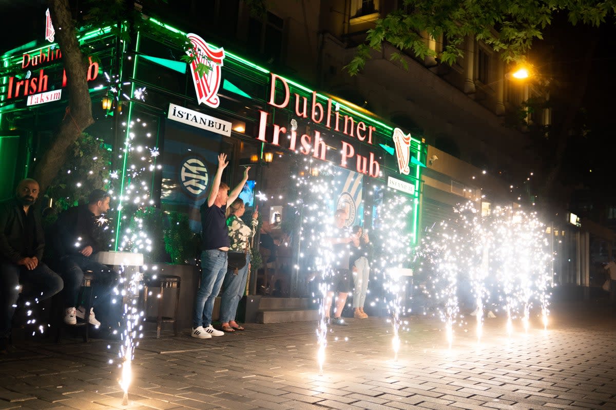 City magic: Manchester City fans outside the Dubliner Irish Pub in Istanbul on Thursday (PA Wire)