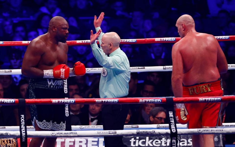 Referee Victor Loughlin stops the fight at the end of the 10th round - Action Images via Reuters/Andrew Boyers