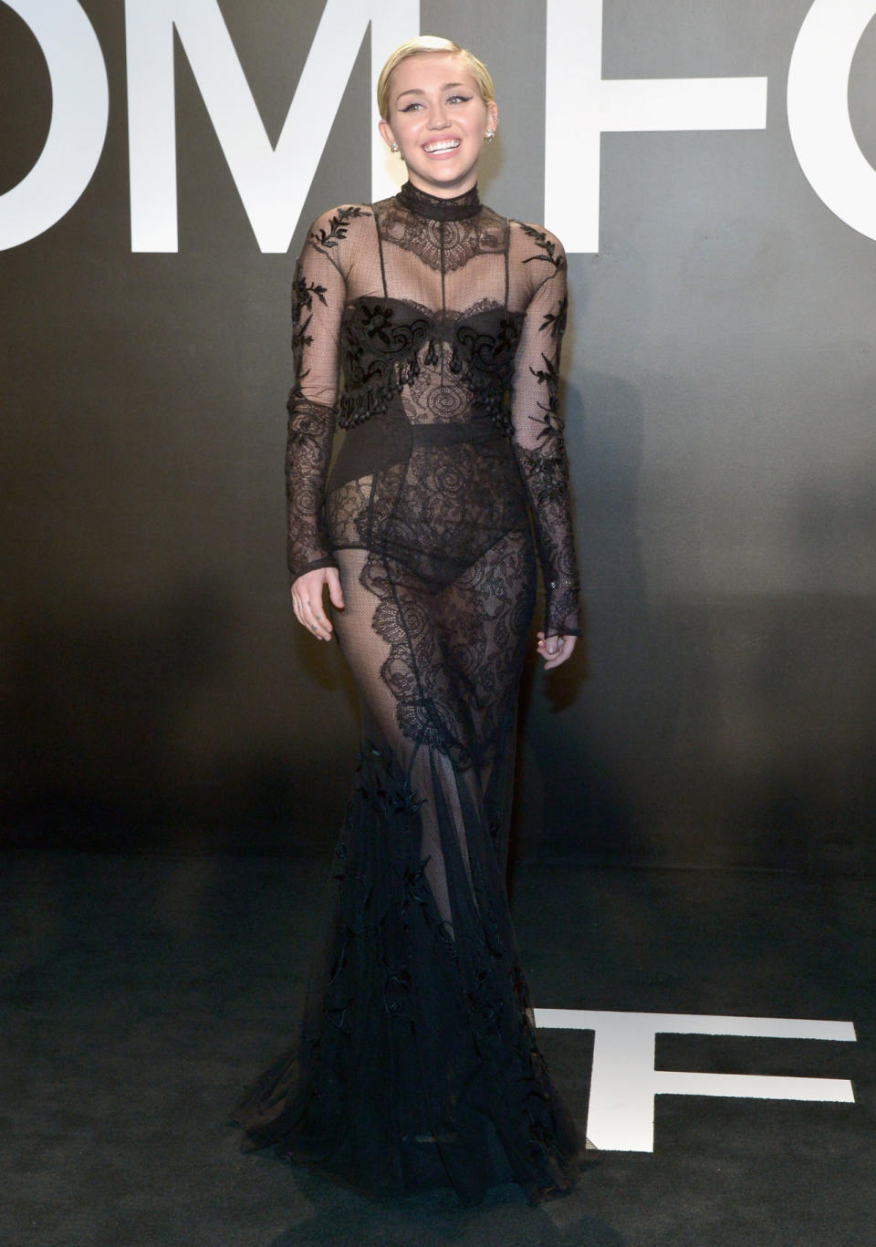 The Bangerz artist looks, well, banging in this all black and sheer Tom Ford dress.