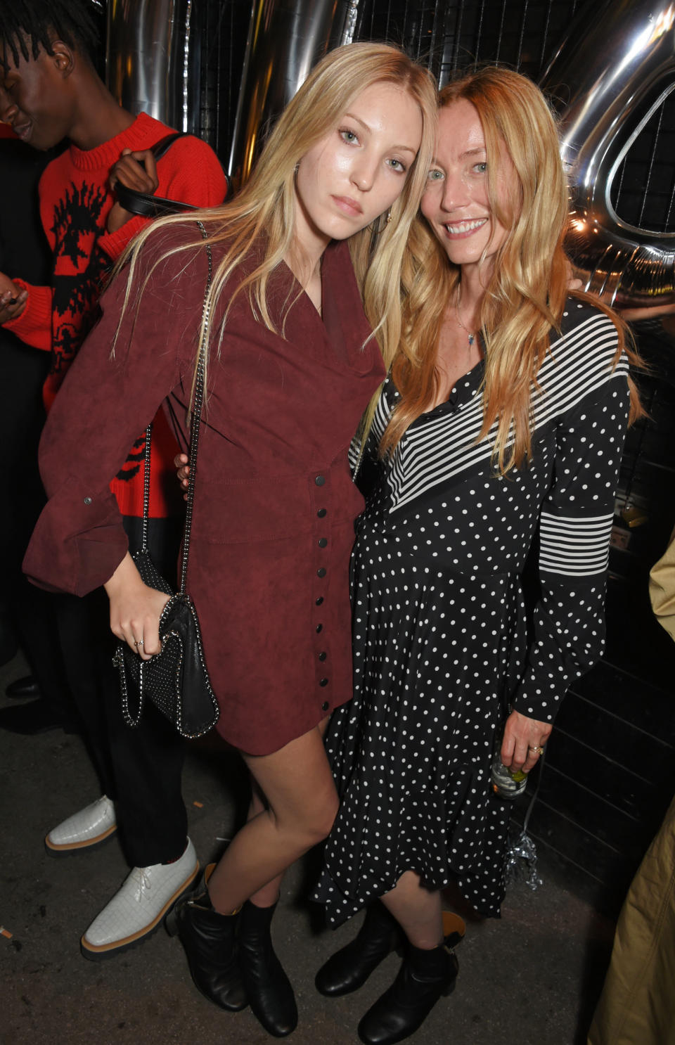 Lucie de la Falaise (right) has modeled for&nbsp;brands like Yves Saint Laurent and Ann Taylor and appeared on the cover of Vogue. She is also the daughter-in-law of Keith Richards and niece of jewelry designer and YSL muse Loulou de la Falaise. <br /><br />Her daughter, Ella Richards (Keith Richards' granddaughter), has been gaining popularity in the industry herself, walking&nbsp;in shows for Pringle of Scotland, appearing in <a href="https://www.telegraph.co.uk/fashion/people/who-is-ella-richards-the-new-face-of-burberry/" target="_blank">ads for Burberry</a> and being photographed with her mom for&nbsp;<a href="https://www.instagram.com/p/BWnSFaDn-Cv/?hl=en&amp;taken-by=ellarichardsr" target="_blank">Vogue</a> and <a href="https://www.stellamccartney.com/experience/us/double-act-london-ella-richards-and-lucie-de-la-falaise/" target="_blank">Stella McCartney</a>.