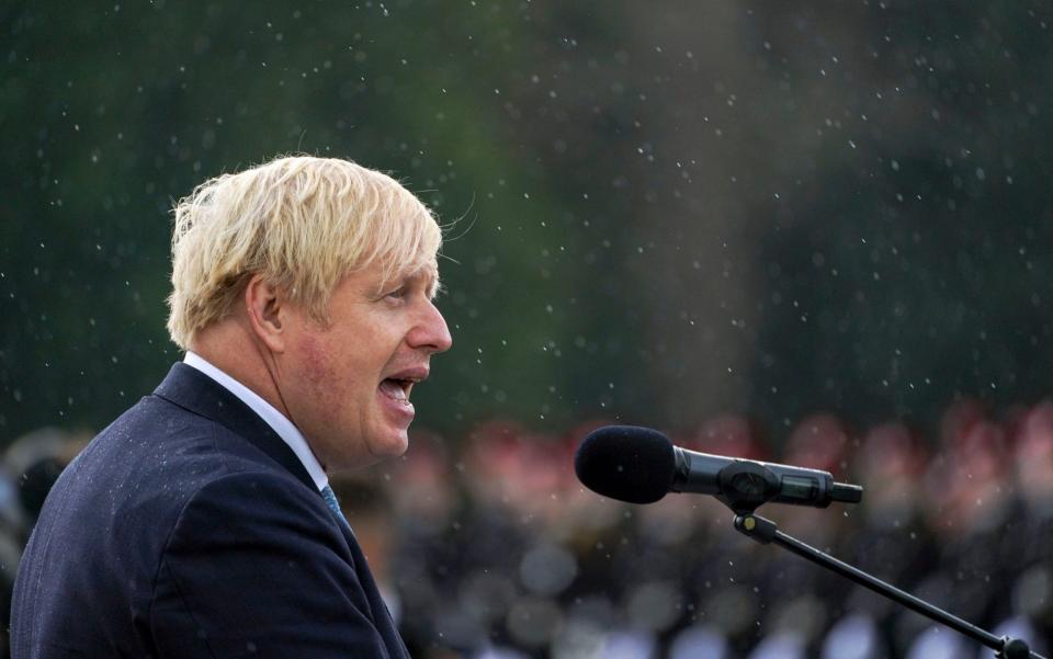 Boris Johnson at the Sovereign's Parade at Royal Military Academy Sandhurst in Camberley on Friday - Steve Parsons/PA Wire