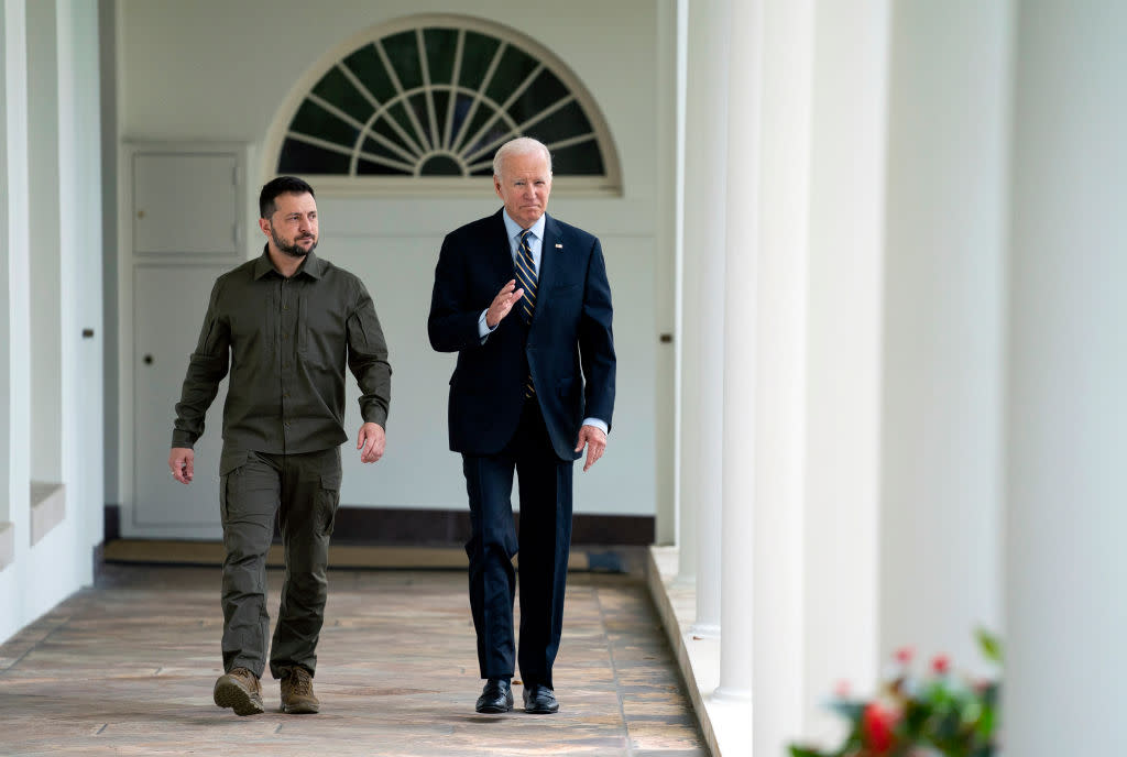   Ukrainian President Volodymyr Zelensky (L) walks with U.S. President Joe Biden down the colonnade to the Oval Office during a visit to the White House September 21, 2023. 