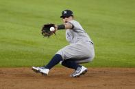 New York Yankees second baseman Rougned Odor fields a double play ball in the second inning of a baseball game in Arlington, Texas, Tuesday, May 18, 2021. The Rangers' David Dahl was forced at second on the play. (AP Photo/Tony Gutierrez)