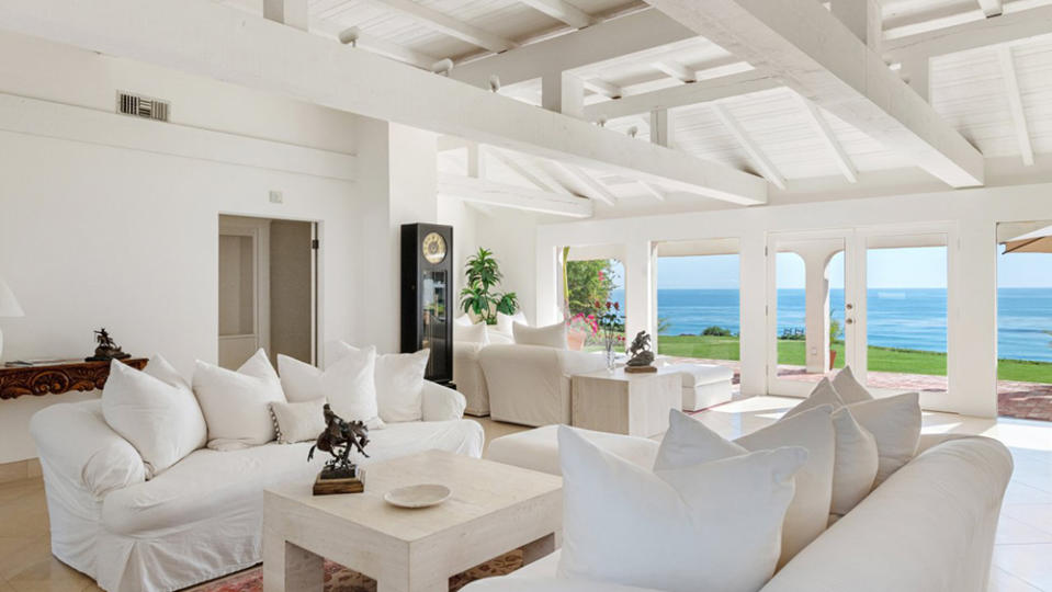 The spacious interior decked out in white with an ocean view. - Credit: Chris Cortazzo