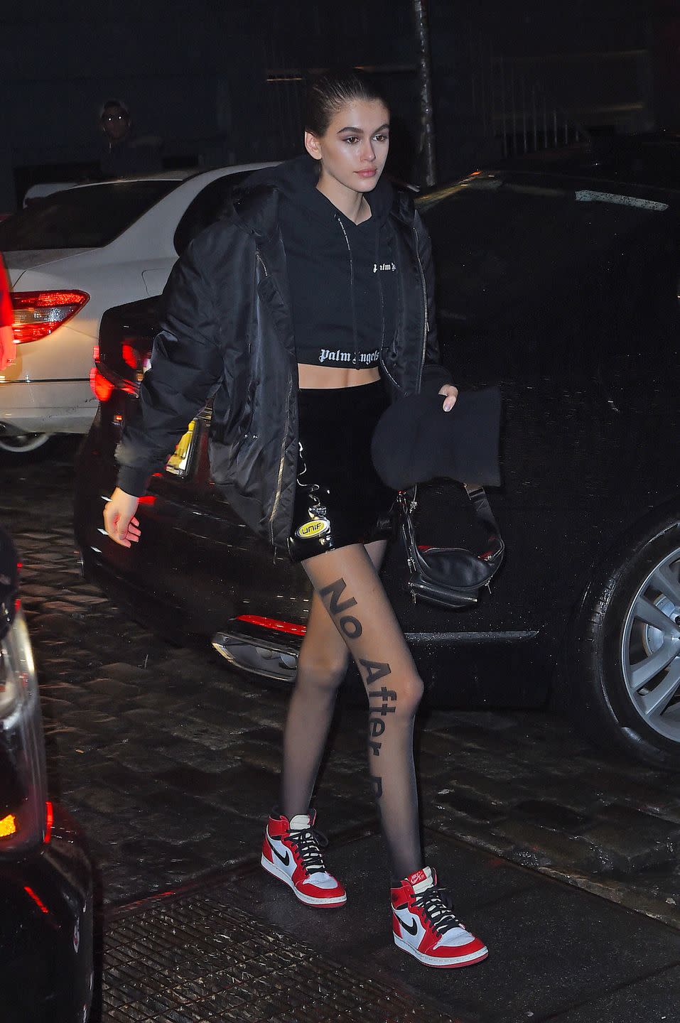 <p>Kaia wore sheer tights and a cropped hoodie for a night out in NYC</p>