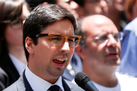 Freddy Guevara (L), First Vice President of the National Assembly and deputy of the opposition party Popular Will (Voluntad Popular), speaks during a news conference in Caracas, Venezuela April 2, 2017. REUTERS/Carlos Garcia Rawlins