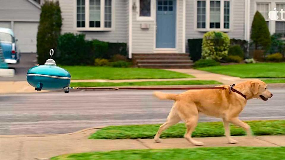 A robot walks a dog in Hello Tomorrow! on Apple TV+.