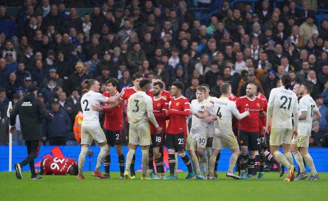 Leeds and Manchester United players clash