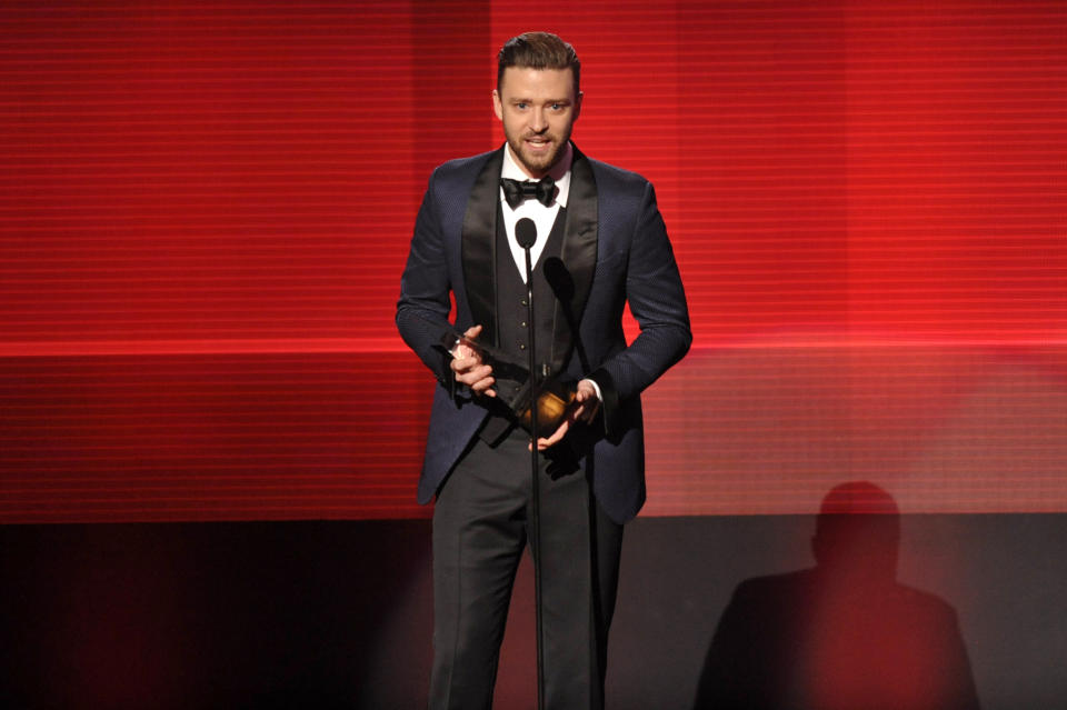 Justin Timberlake accepts the award for favorite male artist - soul/R&B at the American Music Awards at the Nokia Theatre L.A. Live on Sunday, Nov. 24, 2013, in Los Angeles. (Photo by John Shearer/Invision/AP)