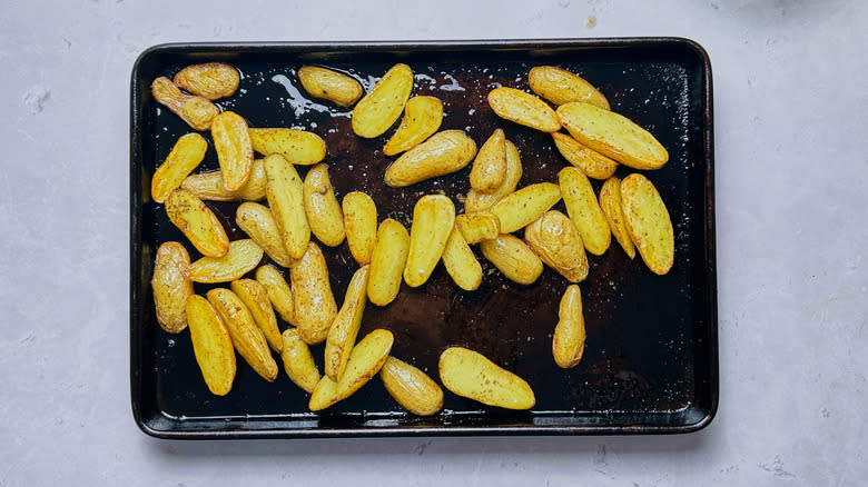 roasted potatoes on a sheet tray