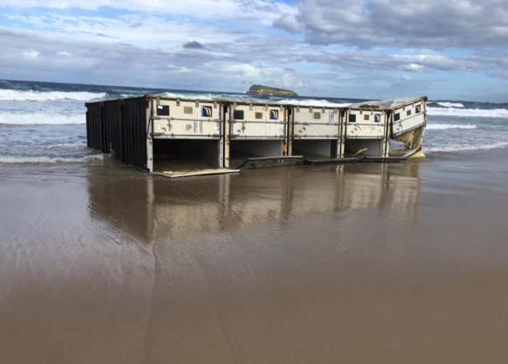 Five shipping containers washed up on Birdie Beach on Wednesday. Source: Facebook/ Erin Sampson