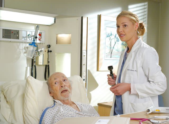 <p>Everett Collection</p> Jack Axelrod and Katherine Heigl as seen on the 'Grey's Anatomy' episode 'Let the Truth Sting'.