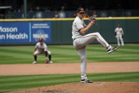 Baltimore Orioles starting pitcher John Means throws against the Seattle Mariners during the eighth inning of a baseball game, Wednesday, May 5, 2021, in Seattle. (AP Photo/Ted S. Warren)