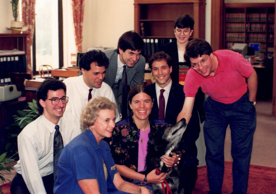 In 1990, U.S. Supreme Court Justice Sandra Day O’Connor and clerks pose with Susan Butcher, winner of that year’s Iditarod sled dog race in Alaska, and her lead dog at the Supreme Court. | Denise Lindberg